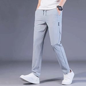 Men S Pants 2023Men S Ice Silk Casual Trousers Summer Snabbtorkning Gym Sports tunn fast färg Fashion Fick Rak Pantalon 230808