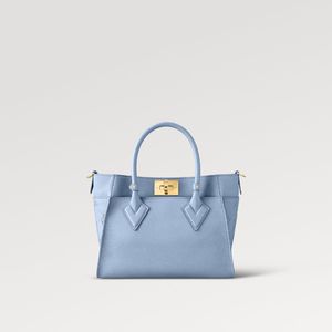 Borse da donna più alla moda tote bag M59432 On My handbag PM moda pannelli in pelle di vitello liscia tasche Mahina grandi traforate Bleu Nuage Blue party