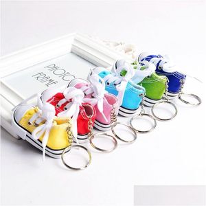 Sko delar Tillbehör Nytt trendigt grossist 3D Sneaker Keychain Colorf Simation Canvas Shoes Key Ring Dolls Drop Delivery