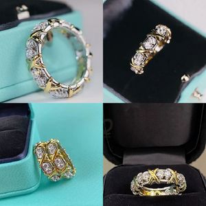 Schlumbergers Großhandel Frauen Liebes Band Ring T Designer Eternität Diamonique CZ Simuliertes Diamant 10KT Whiteylow Gold gefüllt Hochzeitsmarke Kreuzringe für Paare