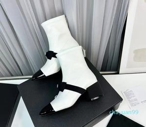 Botas de designer de botas de tornozelo botas de moda de alta qualidade Sapatos de alta qualidade Winter feminino para deslizar barcos redondos de tornozelo