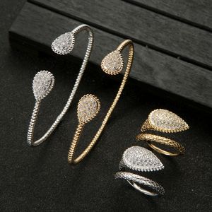 Conjuntos de joias de casamento Oval Cuff Bracelet Ring set Elegant Design Geometric Full Microl Zircônia Wedding Engagement Women Bangle Jewelry S0855 230808