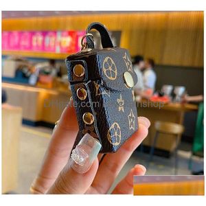 Nyckelringar Fashion Designer Airpods Fall Keychains Trinets Pu Leather Chains smycken Brown Flower Pendant Bag Charms Keyrings Car Keys Dhxyo