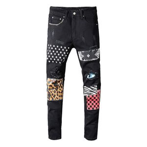 Sokotoo Men's Rivets stjärnor tryckt lapptäcke svarta jeans trendiga streetwear smala fit stretch denim byxor rippade byxor