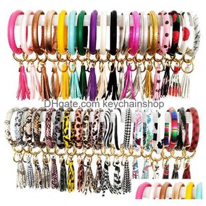 Key Rings Fashion Mtiple Styles Sun Flower/Flag Pattern Chain Leather Wrap Tassels Bracelets Keychain Wristlet Bracelet Tassel Keychai Dhek7