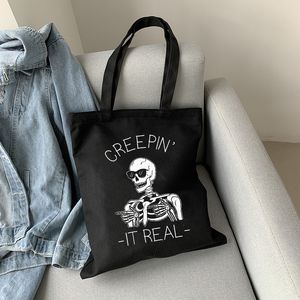 Bolsa de lona estampada de caveira gótica bolsa feminina de desenho animado casual Harajuku bolsa de compras escura bolsa de ombro de grande capacidade