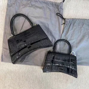 Luxurys Saati Akşam Koltuk Debriyaj Çanta Tasarımcıları Çanta Timsah Desen Crossbody Sling Bag Çöp Strap Strap Womens Cüzdan Erkekler Gerçek Deri Tote Omuz Çantaları