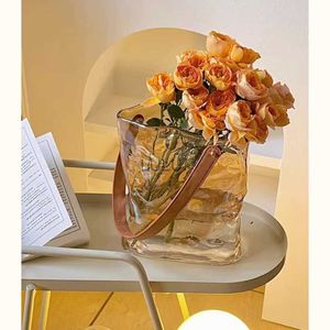 ノルディックライトラグジュアリーハンドバッグガラスガラス花瓶の花緑の植物水耕栽培花ローズリビングルームホームデコレーションVaseHKD230810