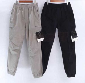 Mens Designer Track Stones Island Pants Womens Casual Cargo Multi-pocket Harem Trousers Fashion Hip Hop Elastic Waist Sportswear Leisure trend 925ess