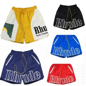 Rhude Mens Mesh Shorts Мода Мужчины Женщины Случайный рефлексивный скейтборд хип -хоп пляж Руд карман высококачественный белый граница короткие черные 493