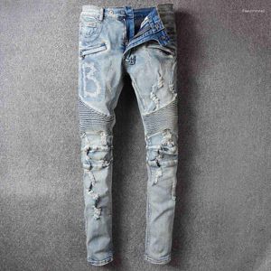 Мужские джинсы винтажные рваные мужчины светло -голубые узкие джинсовые брюки Hommes 2023 Летняя тенденция классическая лоскутная ручка повседневная