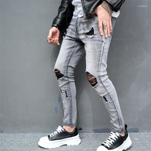 Herr jeans streetwear personlighet rippade ljus grå tvättad smal passformad denim byxor höst ungdom stretch penna byxor