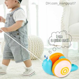 おもちゃを引っ張る小説ドラッグカタツムリの赤ちゃんは光と音楽を歩くことを学ぶロープの幼児教育玩具1-3Y Z230814