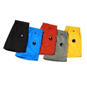 Европейский дизайнер Summer Men One Lins Glanses Pocket Fashion Shorts Flatt Нейлоновая одежда окрашенная плавающие шорты повседневная трасса на открытом воздухе Hip Hop Cp короткие брюки