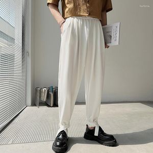 Pantaloni maschili uomini casual elastici di moda straordinaria gamba larga oversize gamba coreana sciolta maschile grigio grigio pantaloni bianchi