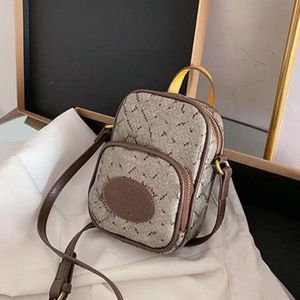 Kvinnors mobiltelefonpåse neovinage mode crossbody väska kamera väska kvalitet lyxigt högt värde designer handväska kvinnors axelväska handväska metalltryck purse658556