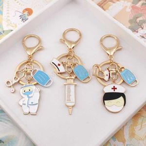 Keychains Lanyards Lovely Big White Medical Angel Key Chain Nurse Doctor Mask Aid Personnel Ring Syringe Stethoscope Pendant L5XT