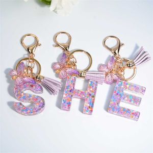 Keychains Lanyards Snowflake Letter Resin Drip Glue Symbol Keychain Women's Fashion Bag 26 English Tassel Butterfly Hangers Keyring Accessories