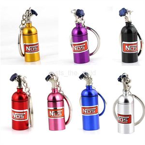 Keychains Lanyards Unique Mini Car Turbo NOS Keychain Nitrogen Bottle Metal Key Ring Stash Pill Box Storage Stylish Car Motorcycle Interior