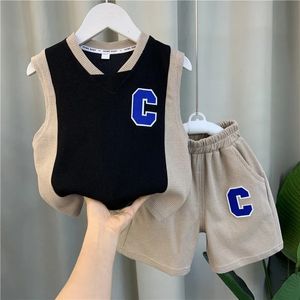 Set di abbigliamento set di t-shirt canotte per bambini Summer Boys 'Baby Net Korean Cool and Handsome Children's Children Set 230812