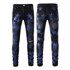 Mäns jeans är rippad blå stjärna lappt skinnbyxor high street byxor mode punk stil mager stretch stretch