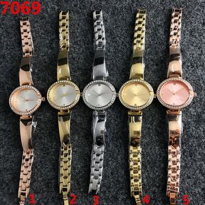 Бренд Quartz Watch Watch for Women Girl Crystal Style Dial Metal Steel Band Watches G34199Z