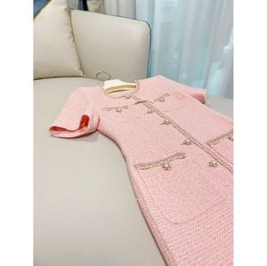 Autumn Round Neck Tweed Paneled Dress Pink Solid Color Kort ärmfickor Single-Breasted Casual Dresses 6288309363356227