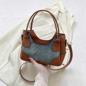 Tendenza personalizzata in denim patchwork ascellata per donne a contrasto minimalista francese colore singolo bagstylishhandbagsstore