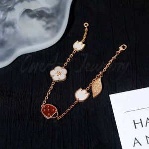 Designer Four-Leaf Clover smycken Tillbehör Kvinnor pläterade 18K Rose Gold Seven Star Ladybug Armband med avancerad känsla liten och lyxig dubbelsidig fem blommor