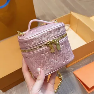 Kvinnors designer präglade mini kosmetiska fodral nano väska med topphandtag mynt charm gyllene blixtlås kedja härlig crossbody axel handväska 4 färger bärbar handväska 12x10 cm