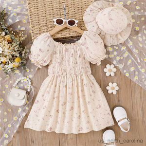 Flickas klänningar barn baby sommarkläder mode kort ärm bomull blommig prinsessa klänning+sunhat små flickor kläder set r230815