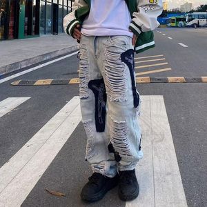 Jeans masculinos High Street Hip Hop Bolheres Ripped Men Loose Palnta de jeans reta Trend Slim Mens Y2K Streetwear