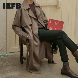 Men's Trench Coats IEFB 2023 Autumn Korean Fashion Double Breasted Windbreaker Middle Long Loose Handsome Coat Belt 9Y5262 230814