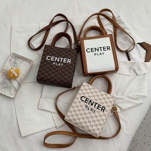 Fashion Lady Bucket Bag Luxus Designerbrief drucken echte Leder -Umhängetaschen vertikale Crossbody -Taschen für Frauenbaus und Leinwand