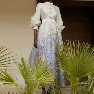 Australisches Designerkleid mit gehobenem Retro -Schmiedeindruck und großer Schwung, schlanker, angemessener langärmer Diamantknopfkleid