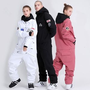 Катание на лыжах, костюма OnePeece Pare Ski Suit мужчины женщины сноуборд устанавливают сноуборд.