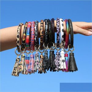 Keychains Lanyards Creative PU Leather Armband Keychain Round Piece Drop Oil Tassel Pendant Delivery Fashion Accessories DHPSD