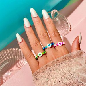 Hochzeitsringe Hallo Mann Punk Acryl Hand Perlenblau Blau rosa Herz Ring Frauen Mode Charme Freundschaft Geschenk Schmuck Schmuck Großhandel Großhandel