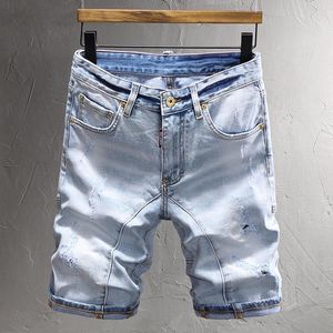 Jeans masculinos Moda de verão Men retro azul claro elástico lavado liso rasgado curto designer emendado shorts jeans vintage