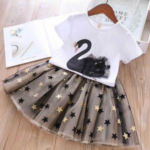 Set di abbigliamento Vestiti per ragazza per bambini T-shirt cigno cartone animato + gonna in tulle stella 2 pezzi Set vestito per bambino Vestito casual per ragazza Moda due pezzi