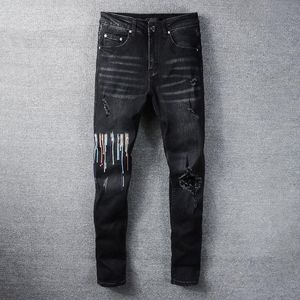 Lila jeans designer män lila jeans kvinnor man amirs smal fit denim brev tryck byxor lyxiga semester utomhus jeans mens streetwear big size byxor jeans 936