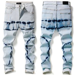 Mäns jeans fyra säsonger ljusblå kedja slips blomma tie färgämne höga elastiska fötter manlig utrikeshandel personlighet trasiga hål koreansk version ko