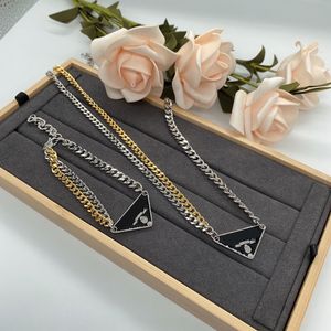 Women Chain Necklace Bracelet Set 18K Gold Plated 925 Silver Classic Triangle Pendant Letter Engraved Personalized Stainless Steel Skeleton Jewelry Accessories