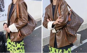 Vintage Cowhide Büyük Kapasiteli Tote Çanta Lüks Marka Tasarımcısı Omuz Çantası Debriyaj Çanta Çantası Crossbody Paketi Akşam Çantaları