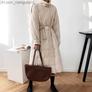 Women's Down Parkas Autumn and Winter Mid length Ultrathin Waist Women's Down Jacket New Fashion Over Knee White Duck Under Hepburn Style Unique Coat Z230817