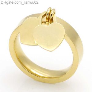 Anelli di fascia Gioielli di moda 316L Ring di titanio Anelli a forma di cuore in golding Lettere lettere a doppio cuore Anello femminile per donna Z230817