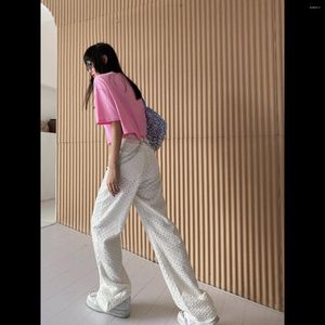 Pantaloni femminili europei primaverili autunno sciolto buco di design vuoto in difficoltà All-match White Straight Women Women Fashion Streetwear 2023