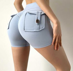 Shorts attivi Donne Pocket Fitness Yoga Solido con leggeri sport elastici Solti di allenamento di allenamento a secco rapido