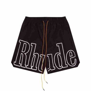 반바지 Mens Rhude 디자이너 소년 짧은 남자 여름 미국 화려한 스타일 빠른 건조 드라이브 스트링 비치웨어 느슨한 스포츠 반바지 남성과 여성 최고 품질