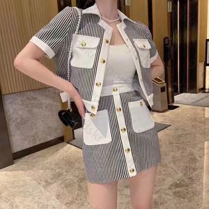 Women Metal Button Shirt Dress Stripe Short Sleeved T Shirt Pleated Skirt Sexy Package Hip Skirt Luxury Women Party Clothing Sets